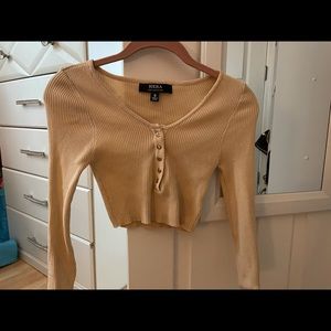 Tan crop top with gold buttons in the front